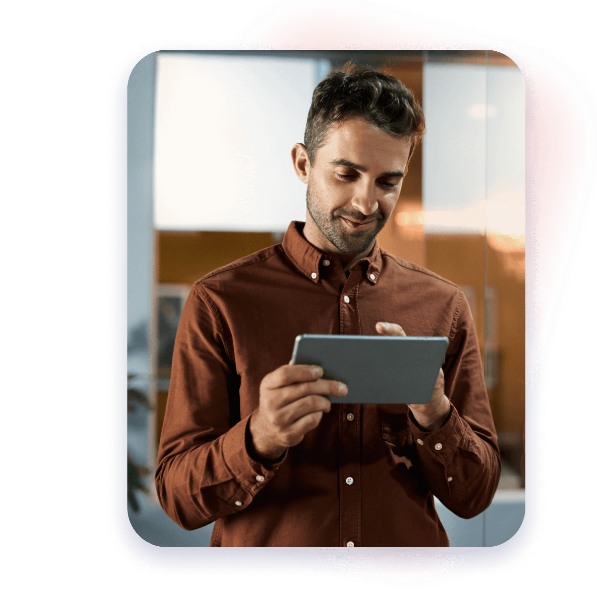 man looking at tablet